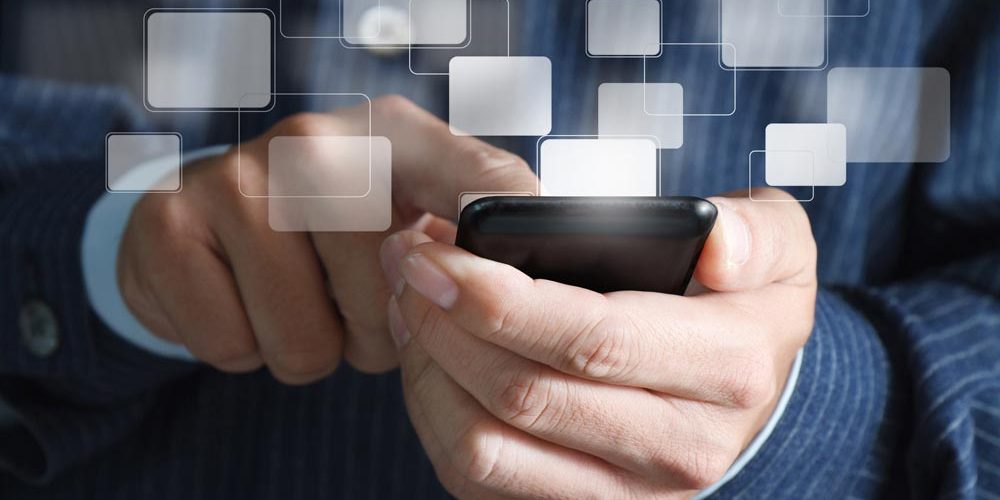 photodune-792391-close-up-of-business-hand-hold-touch-screen-mobile-phone-and-buttons-m